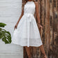 Elegant White Embroidered High-waisted Halter Dress With A Cinched Waist