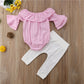 Costume deux pièces à rayures, manches évasées, pantalon déchiré