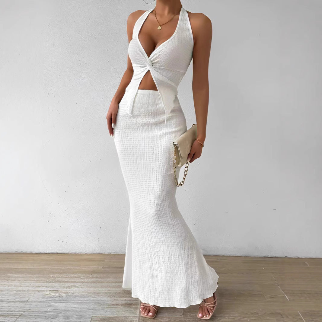 Women's Solid Color Twist Front Hanging On Neck Crop Top And Fishtail Midi Skirt