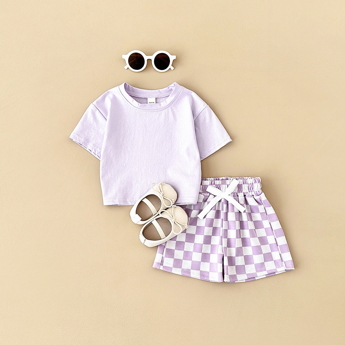 Ensemble deux pièces pantalon à carreaux et motif damier pour enfant