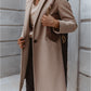 Manteau en laine mi-long à boutons et revers de couleur unie