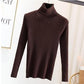 Tight pullover turtleneck sweater for women