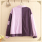 Loose-fitting color-matching coat