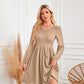 Robe trapèze à manches longues et col rond avec poche