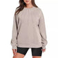Pull ample et décontracté à col rond et plissé pour femme