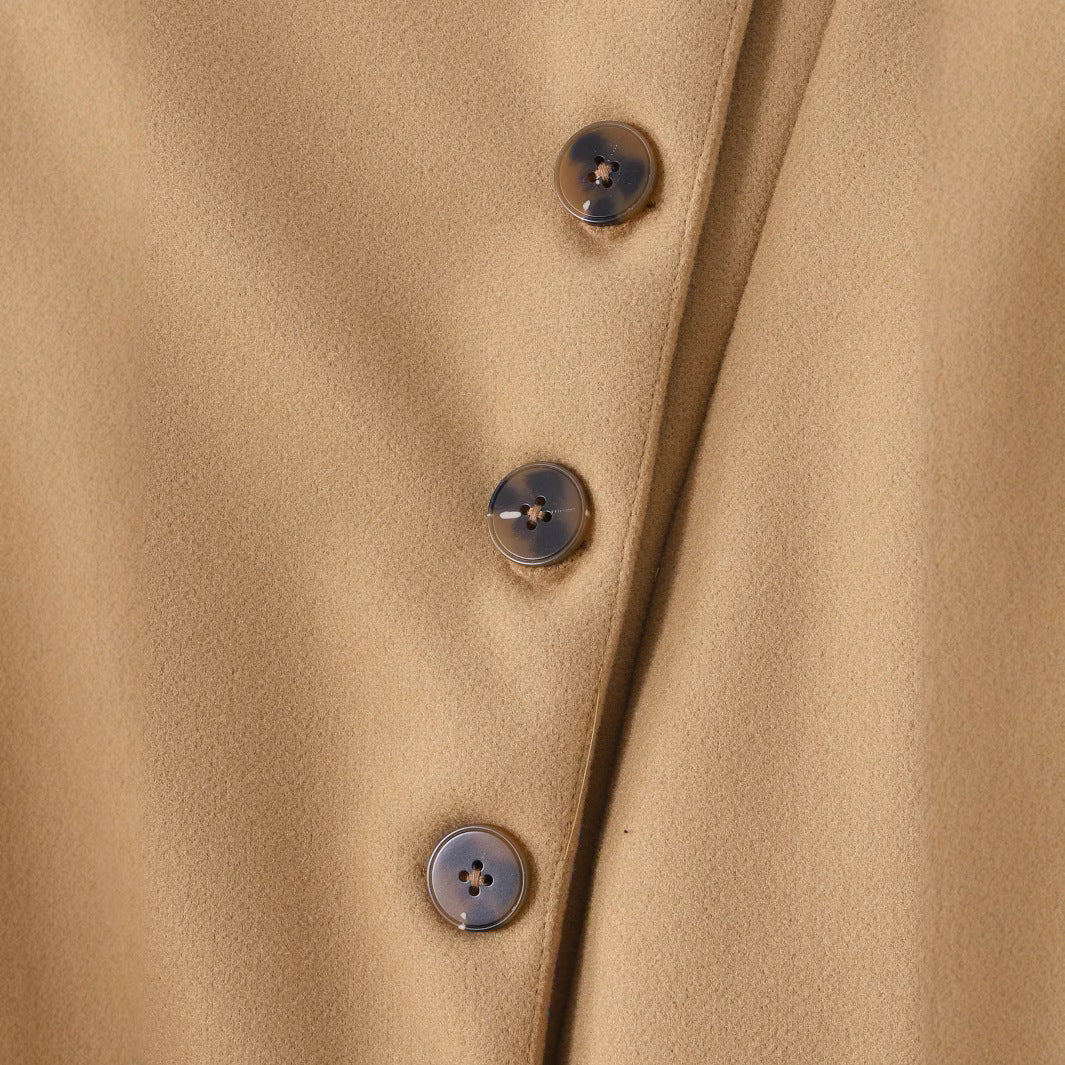 Veste tricotée à lacets et nœud à revers pour femme