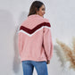 Veste en peluche à col haut, coutures, poches rayées et fermeture éclair