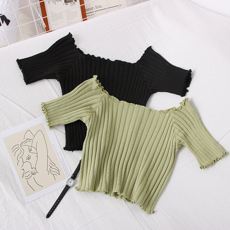 Pull en tricot à épaules dénudées avec oreilles en bois