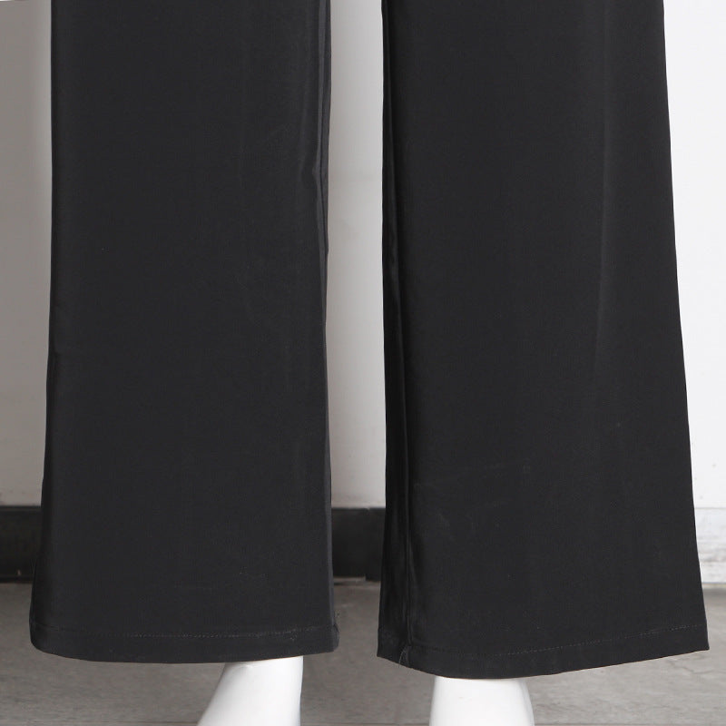 Striped jumpsuit with suspenders and bow