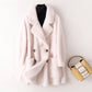 Manteau mi-long ample en laine de mouton pour femme