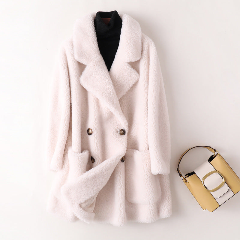 Manteau mi-long ample en laine de mouton pour femme