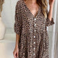 Robe courte à poches et col en V