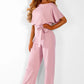 Short sleeve women's jumpsuit with lace button