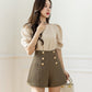 Short de costume taille haute à boutonnage ample en A