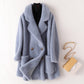 Manteau mi-long ample en laine de mouton pour femme