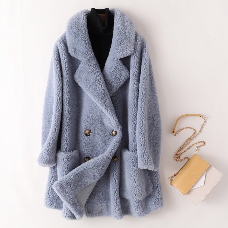 Manteau mi-long ample en laine de mouton pour femme
