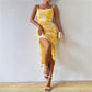 Printed High Waisted Figure Hugging Wrap Skirt With A Slit And A Strapless Design