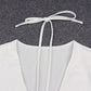 Slim Fitting Short Long Sleeve Top With Metal Buttons