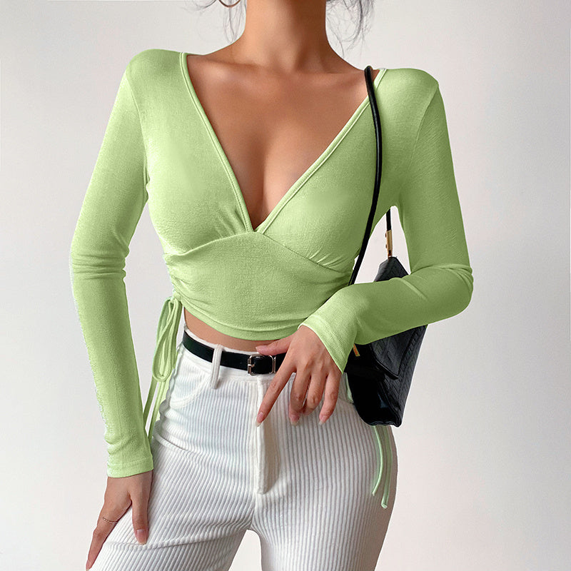 Short Cross  Drawstring Reveals Chest And Long Sleeves