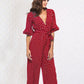 Half sleeve V-neck polka dot print jumpsuit