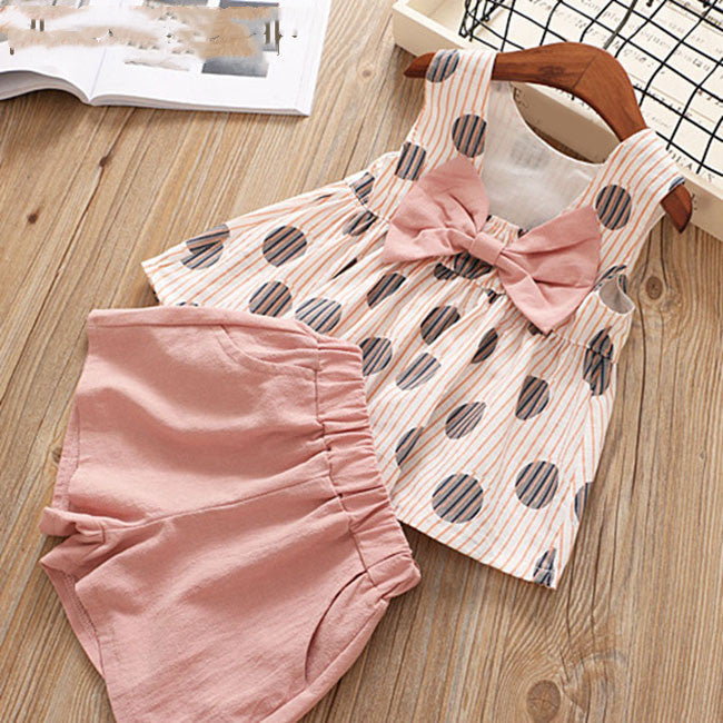 Two piece vest and skirt suit