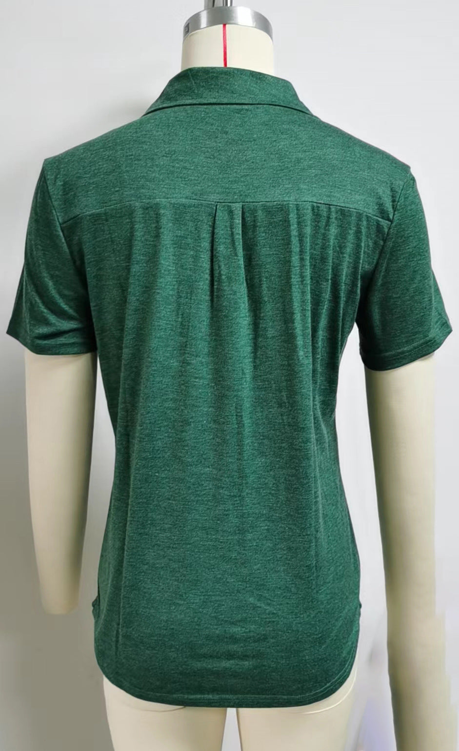 T-shirt ample à manches courtes et poches à revers de couleur unie