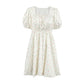 Robe élégante à manches bouffantes et à fleurs françaises