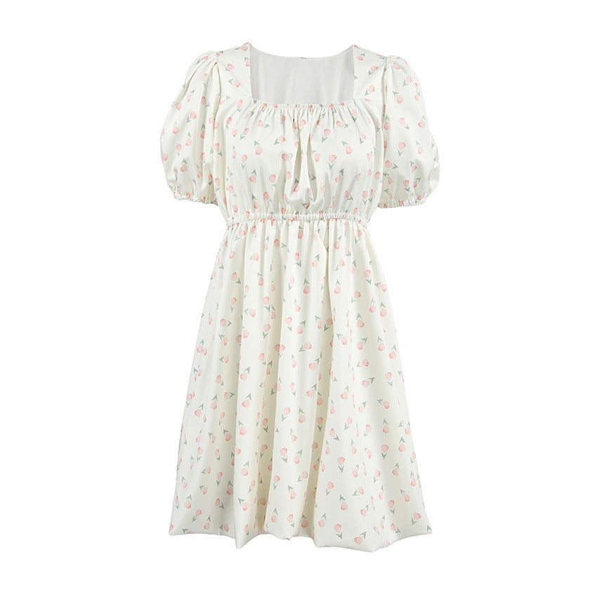 Robe élégante à manches bouffantes et à fleurs françaises