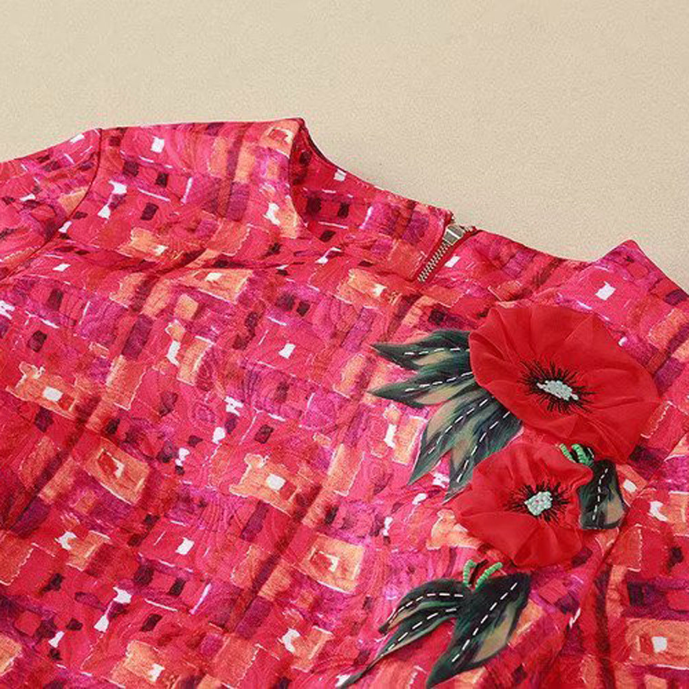 Robe mi-longue à carreaux et motifs jacquard tridimensionnels
