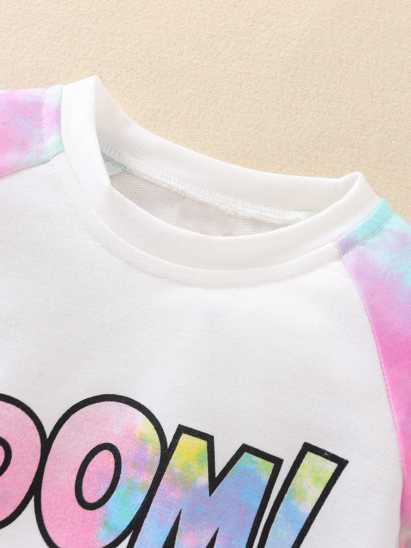 Nouveau costume à manches longues avec coutures tie-dye de l'INS