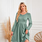 Robe trapèze à manches longues et col rond avec poche