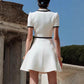 Black-trimmed Dress With A White Zipper Design