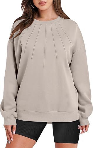 Pull ample et décontracté à col rond et plissé pour femme