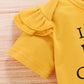 Ensemble trois pièces veste à manches courtes et short tournesol pour bébé