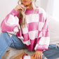 Pull à carreaux contrastés, style ample et décontracté, avec coutures