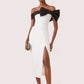 Robe de soirée longue fendue noire et blanche avec nœud