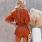 The New V-neck Leaky Back Printed Jumpsuit