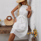 Elegant White Embroidered High-waisted Halter Dress With A Cinched Waist