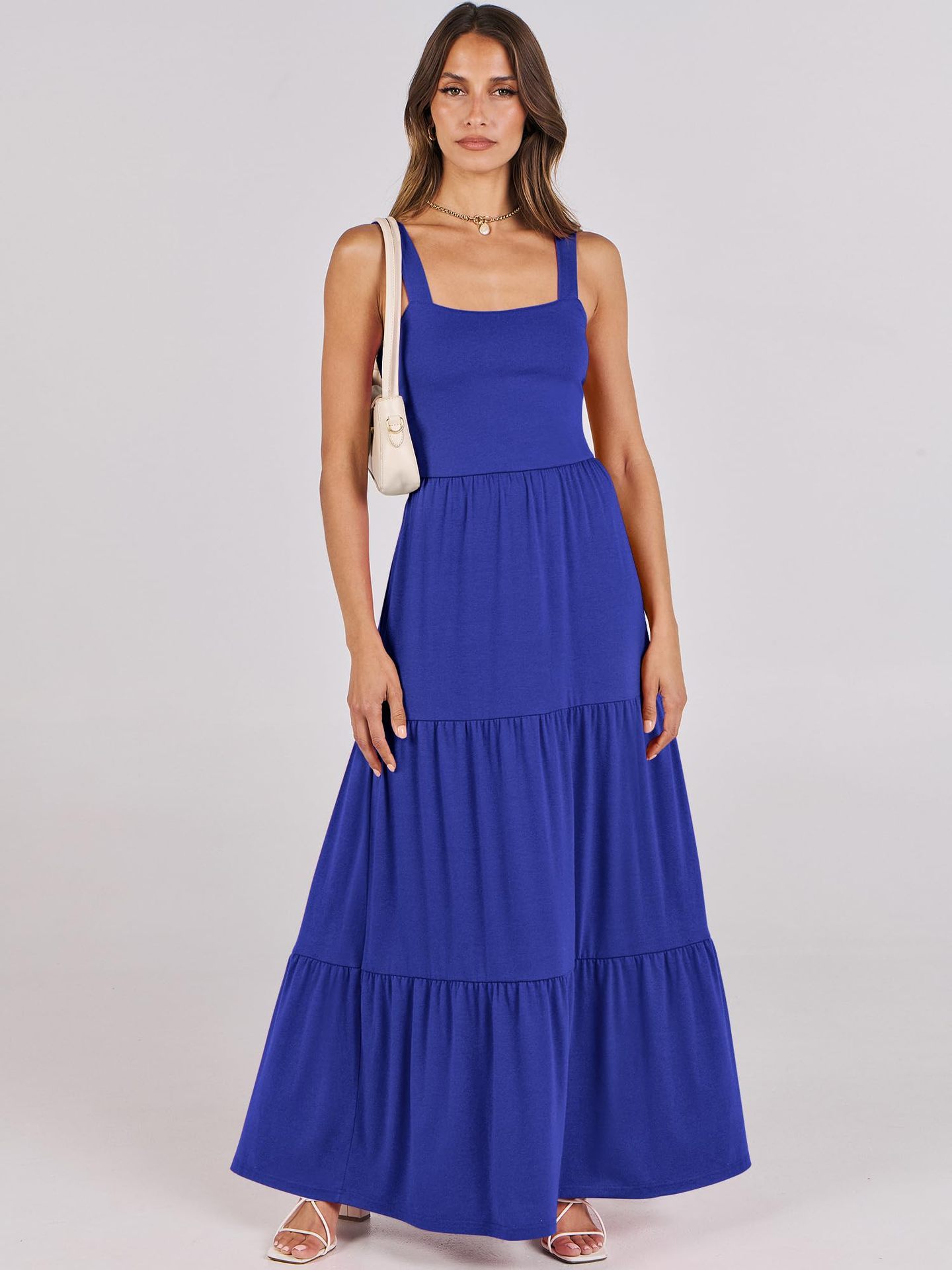 Robe sans manches à bretelles spaghetti et poches pour femme