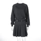 Ensemble deux pièces avec pull à manches longues et jupe plissée