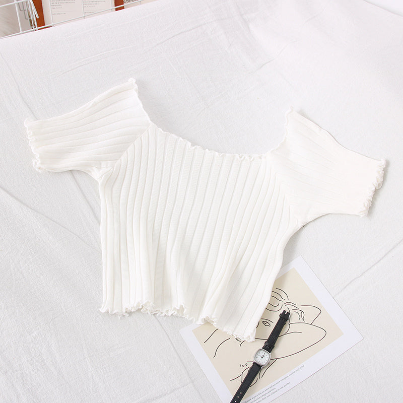 Pull en tricot à épaules dénudées avec oreilles en bois