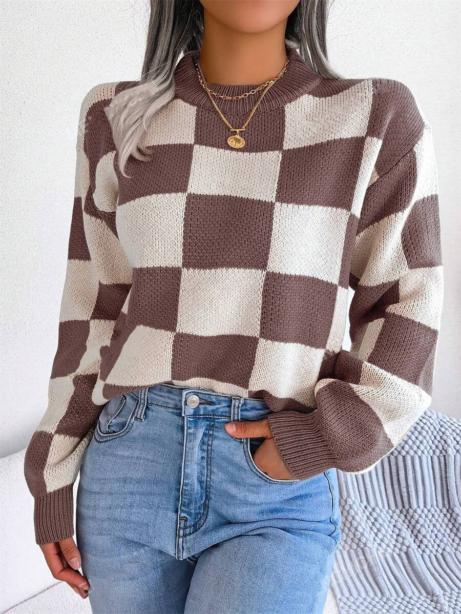 Pull à carreaux contrastés, style ample et décontracté, avec coutures