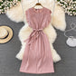 Refined Preppy-style Lady With An Elegant Feminine Look Adorned With Ruffled Cuffs