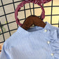 Veste à col montant à simple boutonnage