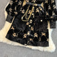 Robe en velours doré à simple boutonnage et revers