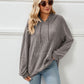 Pull tricoté à capuche et à rayures avec poche kangourou
