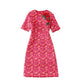 Robe mi-longue à carreaux et motifs jacquard tridimensionnels