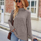 T-shirt ample à manches longues et col montant pour femme