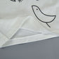 T-shirt à nœud + jupe à carreaux
