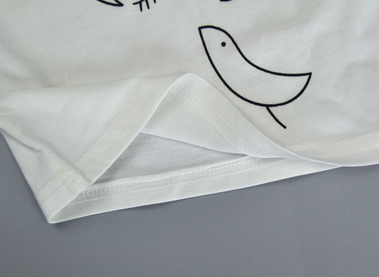T-shirt à nœud + jupe à carreaux